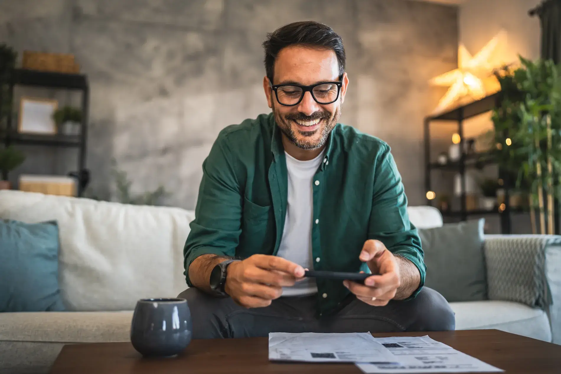 man-scanning-docs-with-phone